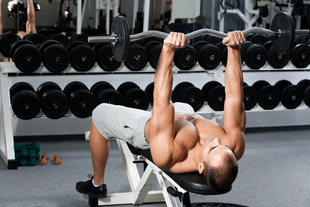 a man doing lying tricep extension