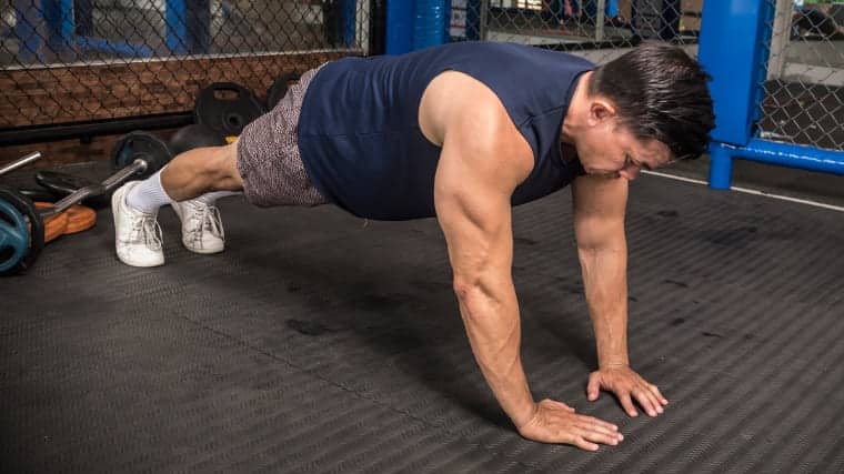 a man doing diamond pushups 