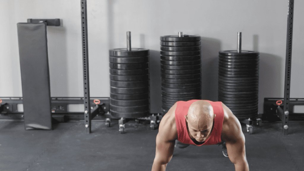 man doing Push up Barbell