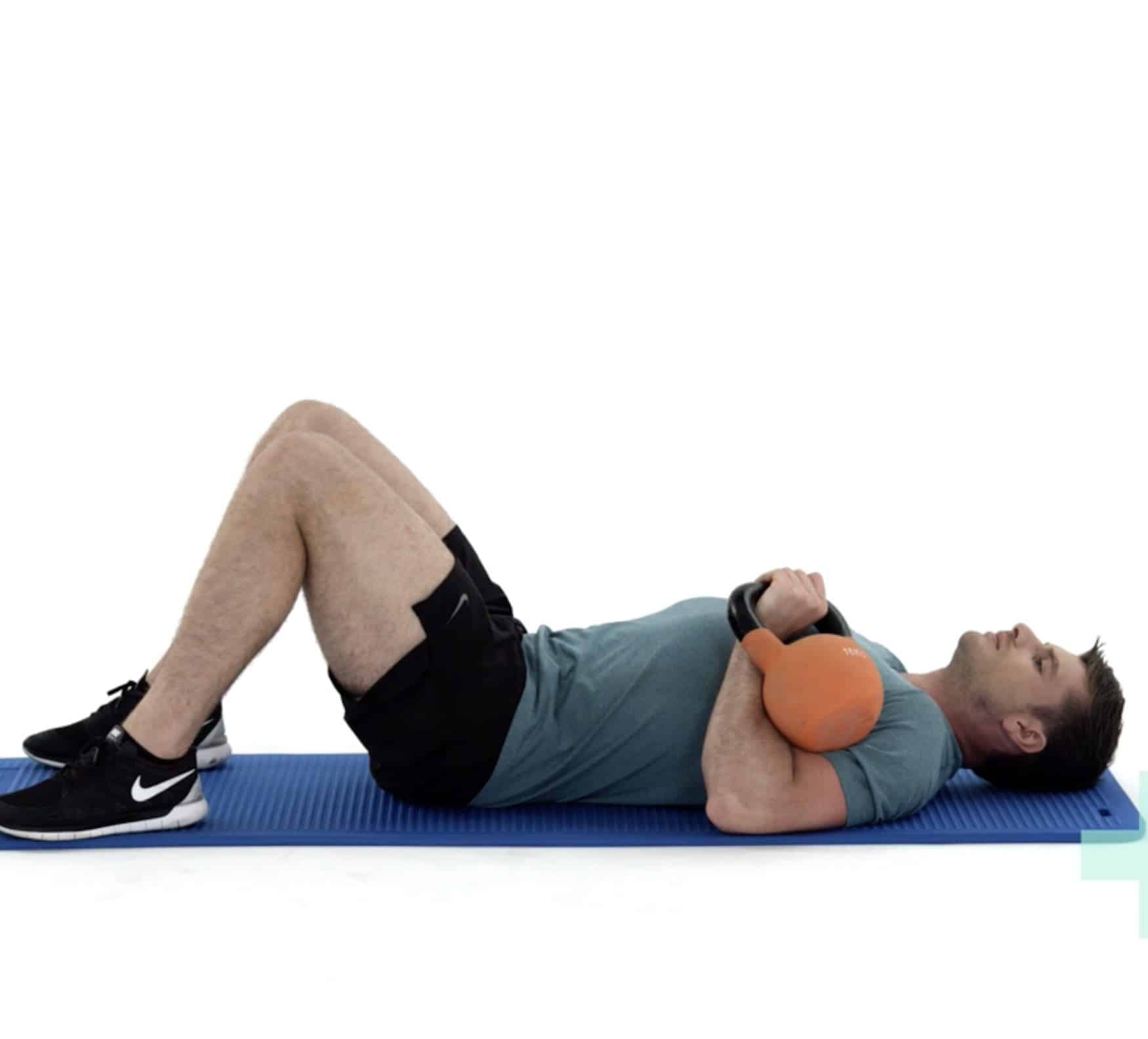 a woman doing Single arm kettlebell Tricep Extension 