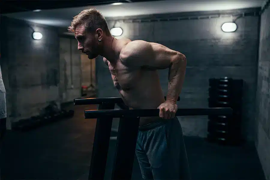 a man is doing Chest Dips