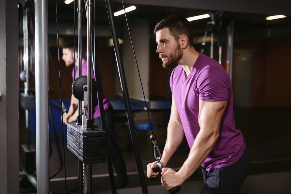 Young Adult Bodybuilder Healthy Fitness Man Doing Triceps Overhead Extension