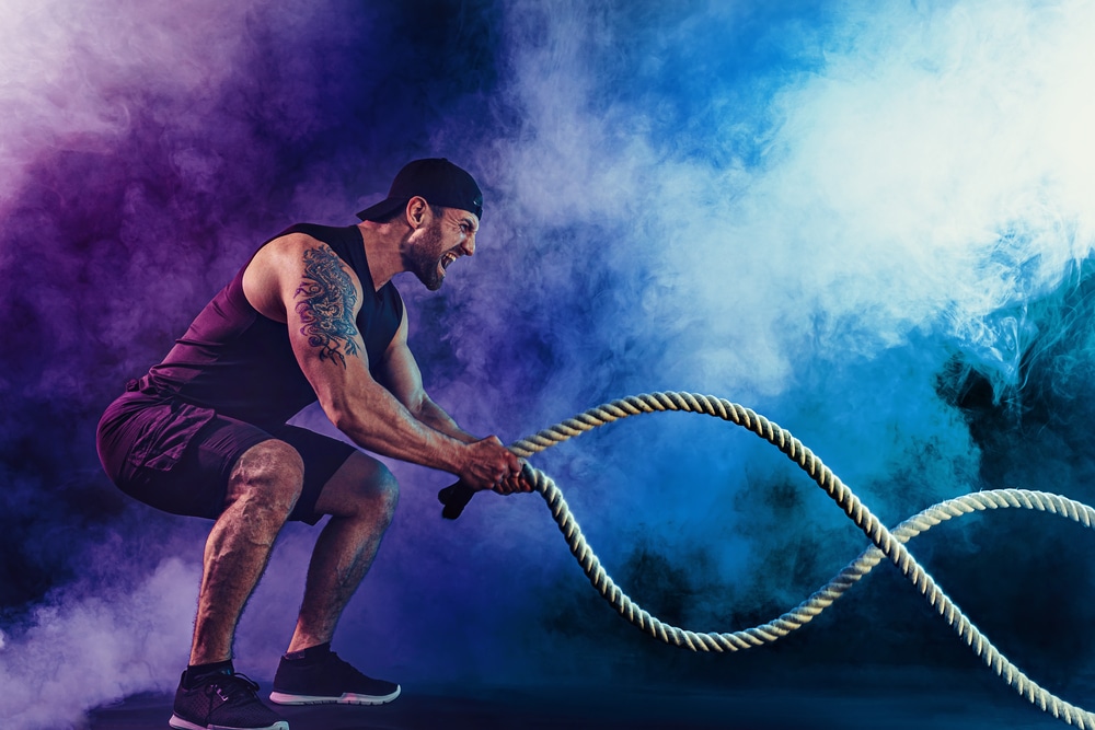 Bearded Athletic Looking Bodybulder Work Out With Battle Rope On